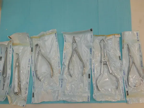 Sterilised instruments in sealed pouches